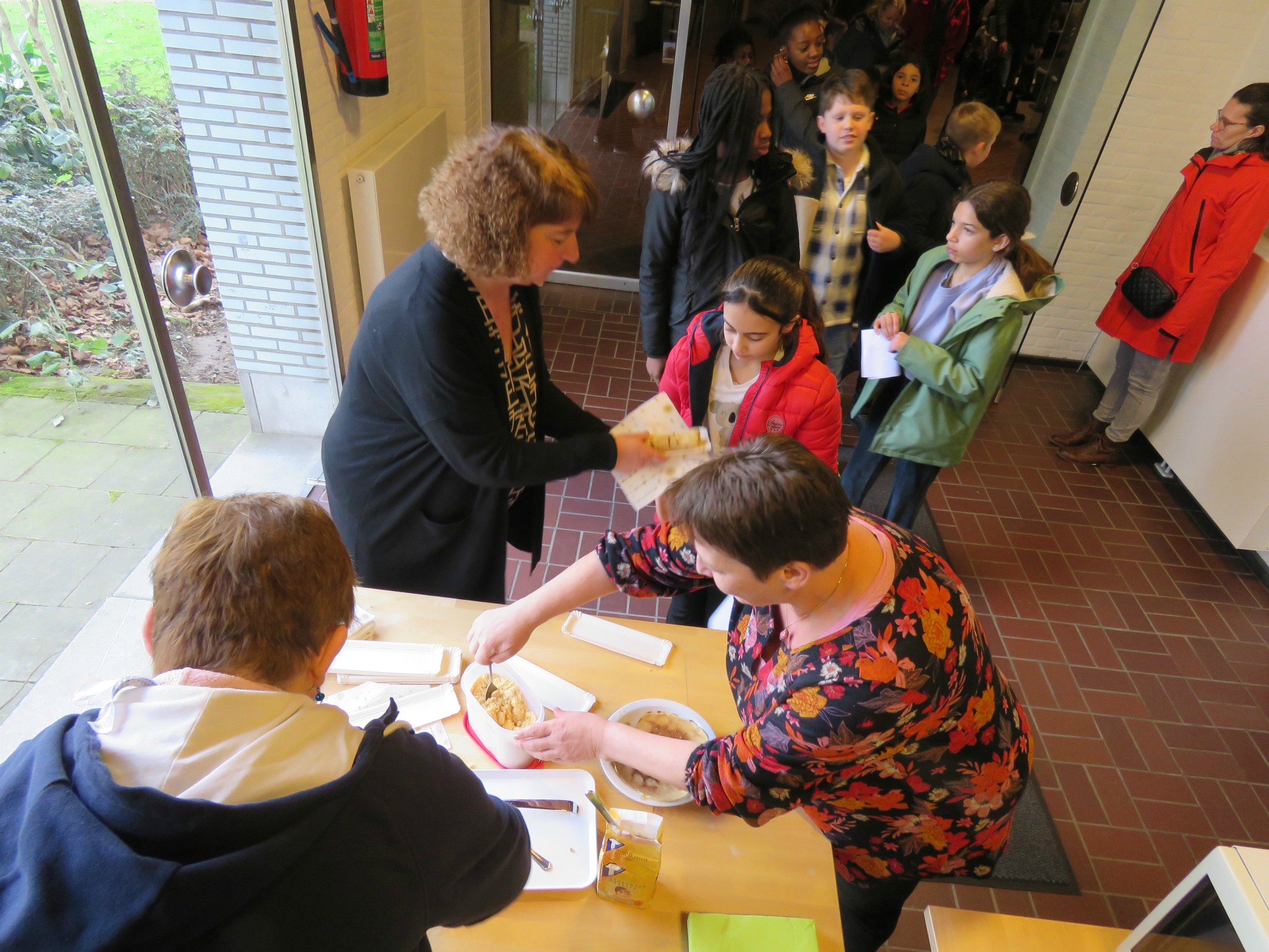 Pannenkoeken na de viering door Hilde, Veerle, Koen en Inge