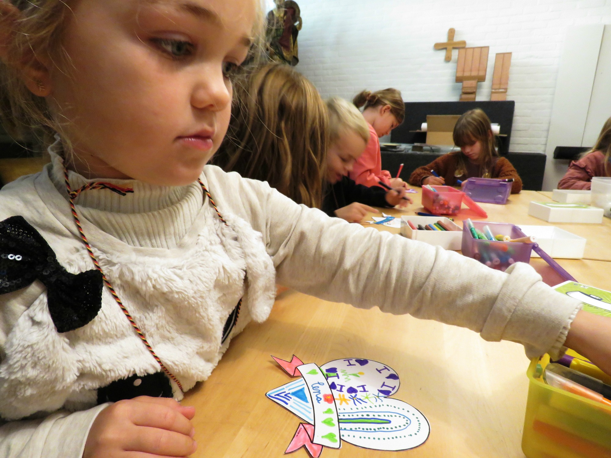 Catechesemoment 1 - Je naam tekenen want dat is nodig bij de viering